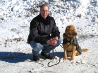 Somers resident Steve Reid, owner of S.R. Dog Training LLC, is shown above with Lily, who is available for adoption at the Putnam Humane Society in Carmel.   