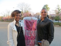 BOCES designer Dana Brown, 17, and her mom, Lorraine. Dana is displaying her "Sparking Ice" drink evening gown. Jon Craig Photo