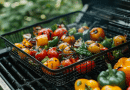 bbq vegetable baskets - photo of a grill basket with vegetables on top of a grill