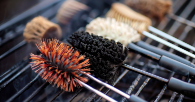 best bbq grill brush - photo of several types of cleaning brushes on a cold grill