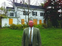 Yorktown Town Supervisor Michael Grace in front of the Adams-Bernstein House.