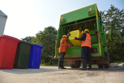 Garbage collector Worker of urban municipal recycling garbage collector ...